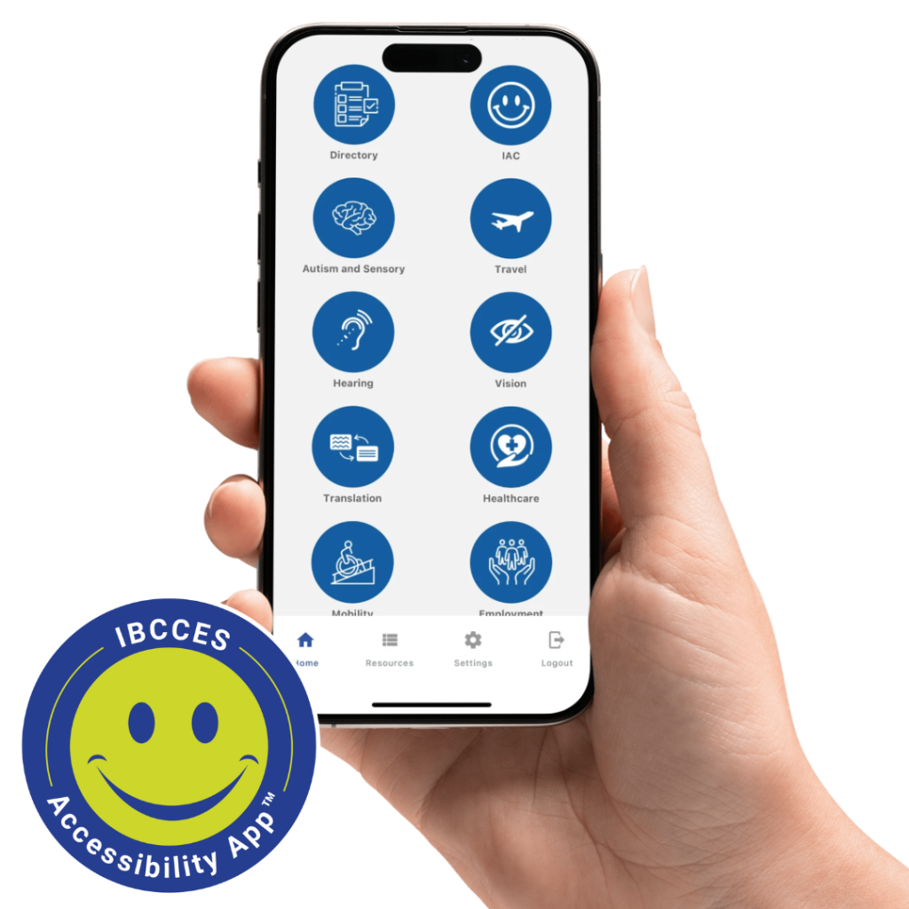 Person holding smartphone with the IBCCES Accessibility App displayed with the logo beside the hand